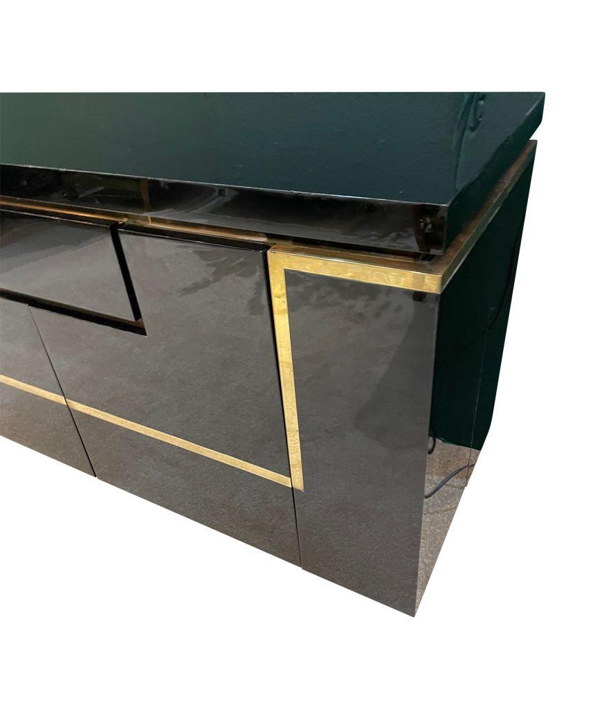 A1970s black piano lacquer and brass sideboard by Jean Claude Mahey For Sale 8