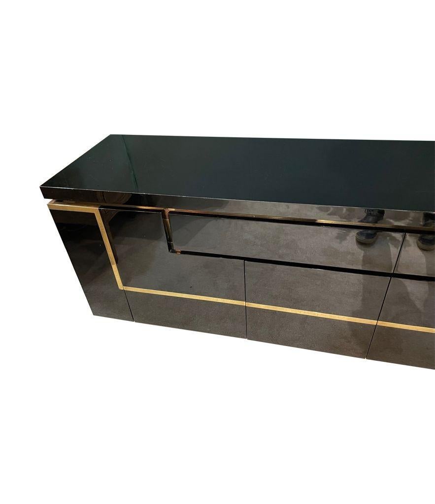 A1970s black piano lacquer and brass sideboard by Jean Claude Mahey For Sale 11