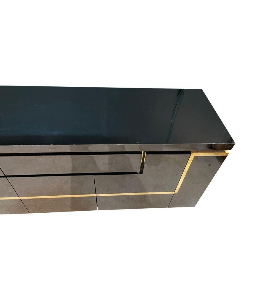 A1970s black piano lacquer and brass sideboard by Jean Claude Mahey For Sale 12