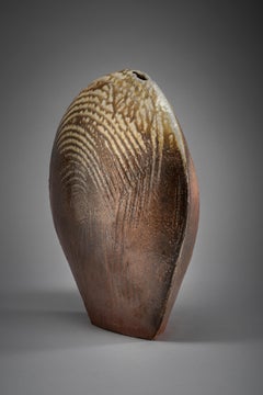 Water Rhythm - buff stoneware, combed flashing slip