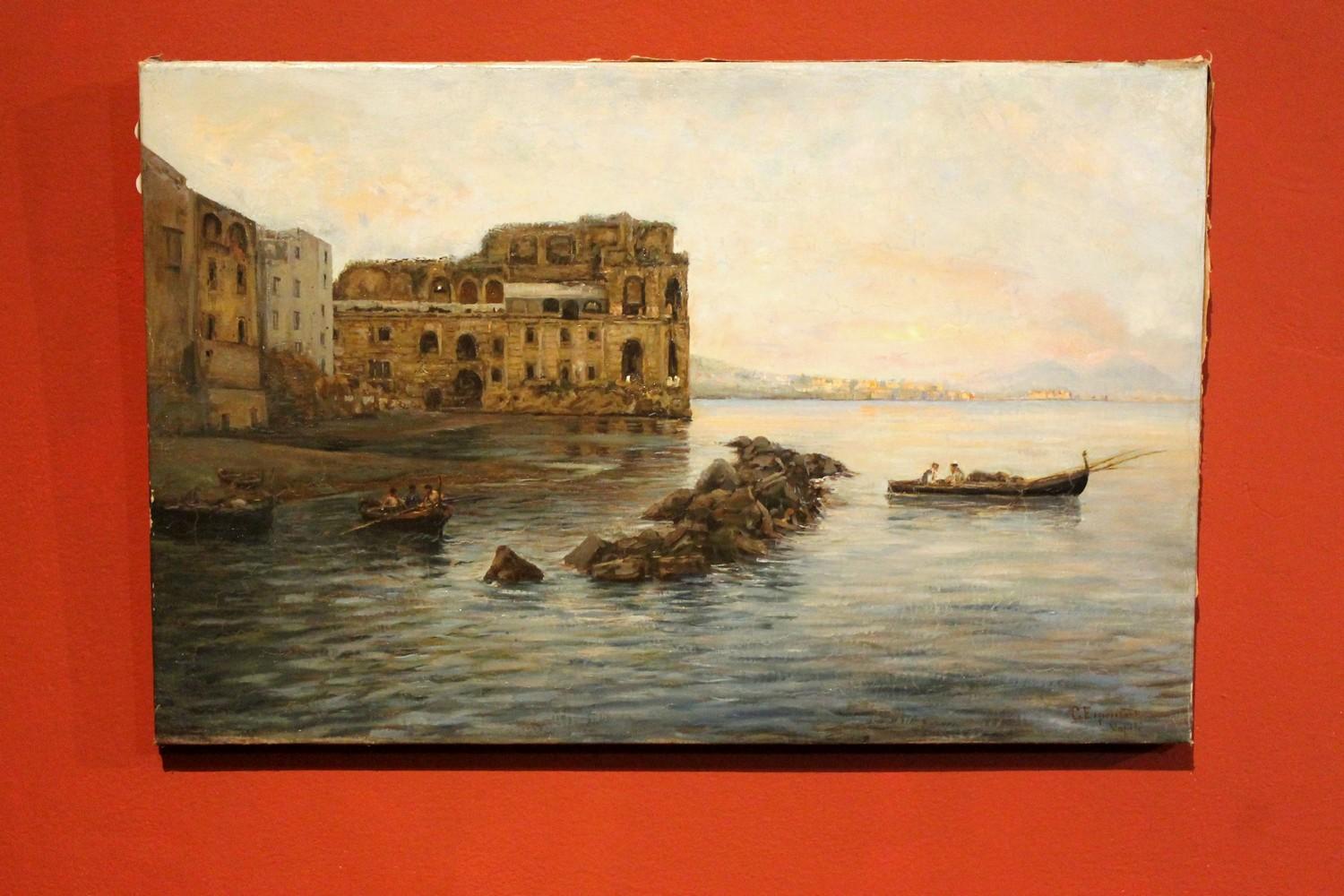 This Italian late 19th century impressionist  oil on canvas painting, depicting a pleasant seascape scene with boats and architectures is signed lower right by Gaetano Esposito, a talented painter and a member of the Posillipo School. 
The canvas