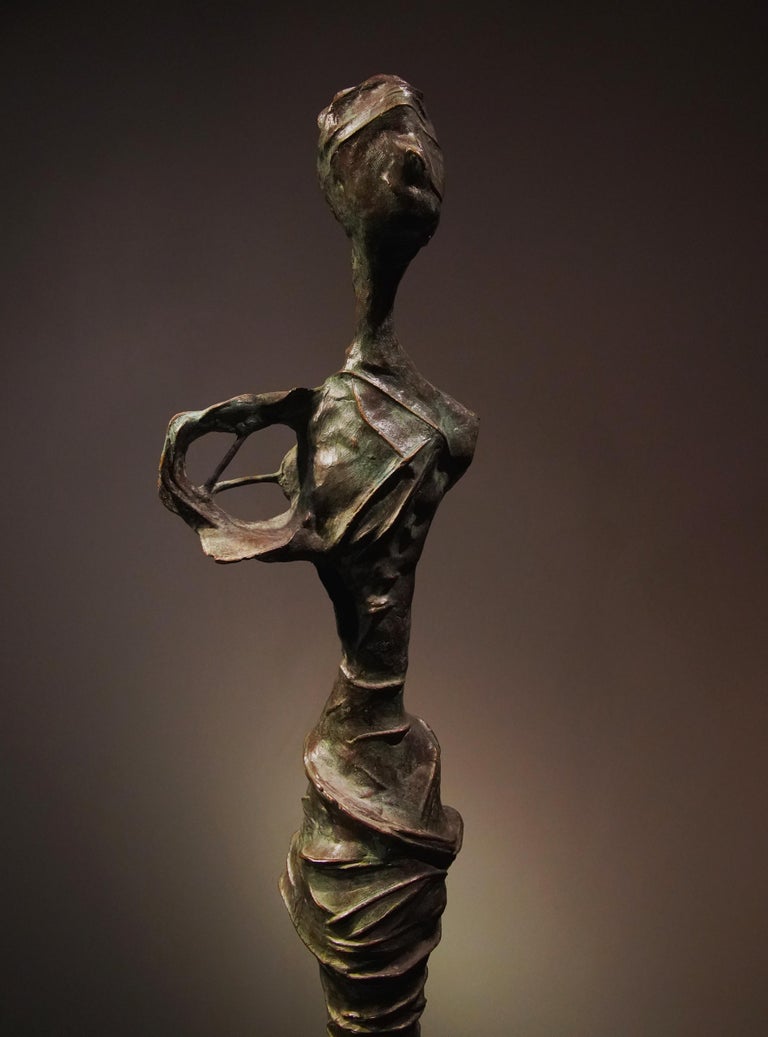 “Over Time” by abstract-figurative artist, Frank Arnold of the U.S. and Mexico - Gold Figurative Sculpture by Frank Arnold