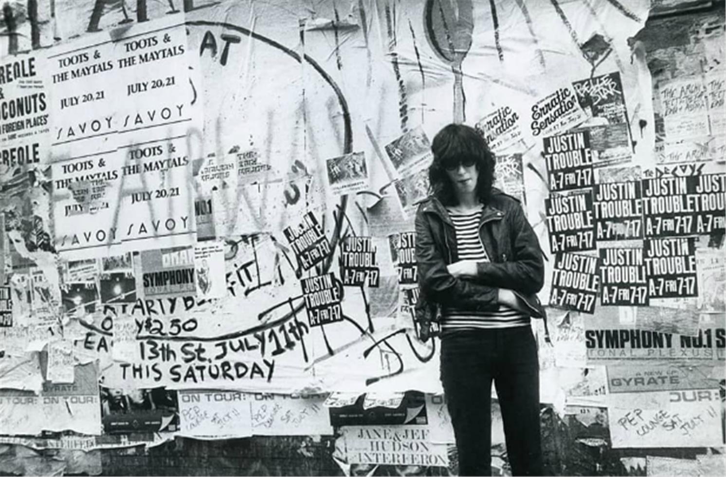 David Godlis Black and White Photograph – Joey Ramone, St. Mark's Place, NYC, 1981