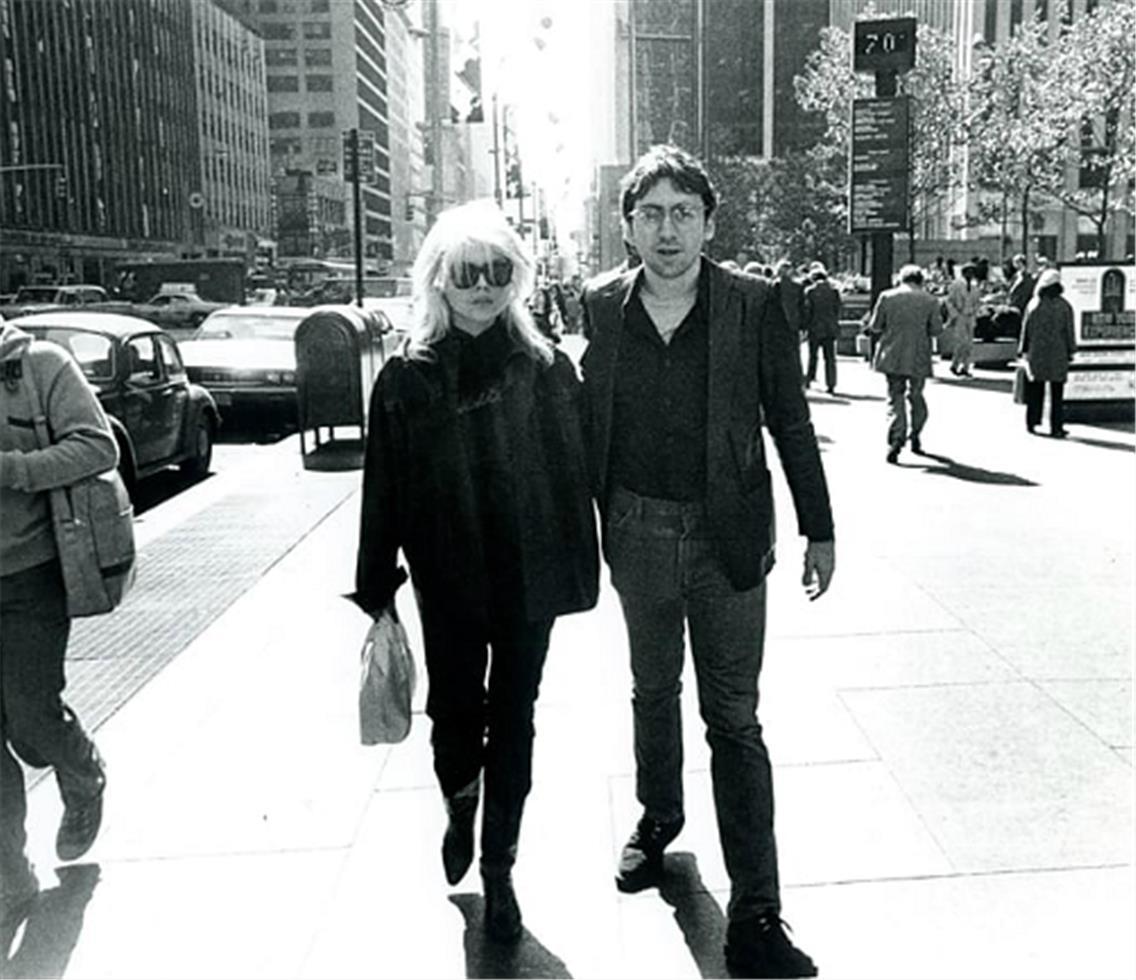 David Godlis Black and White Photograph - Debbie Harry and Chris Stein, Blondie, Sixth Ave., NYC, 1978