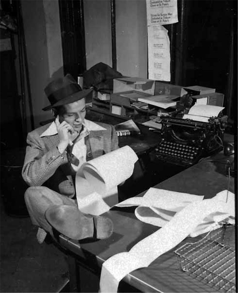 Peter Martin Black and White Photograph - Frank Sinatra at the office #2