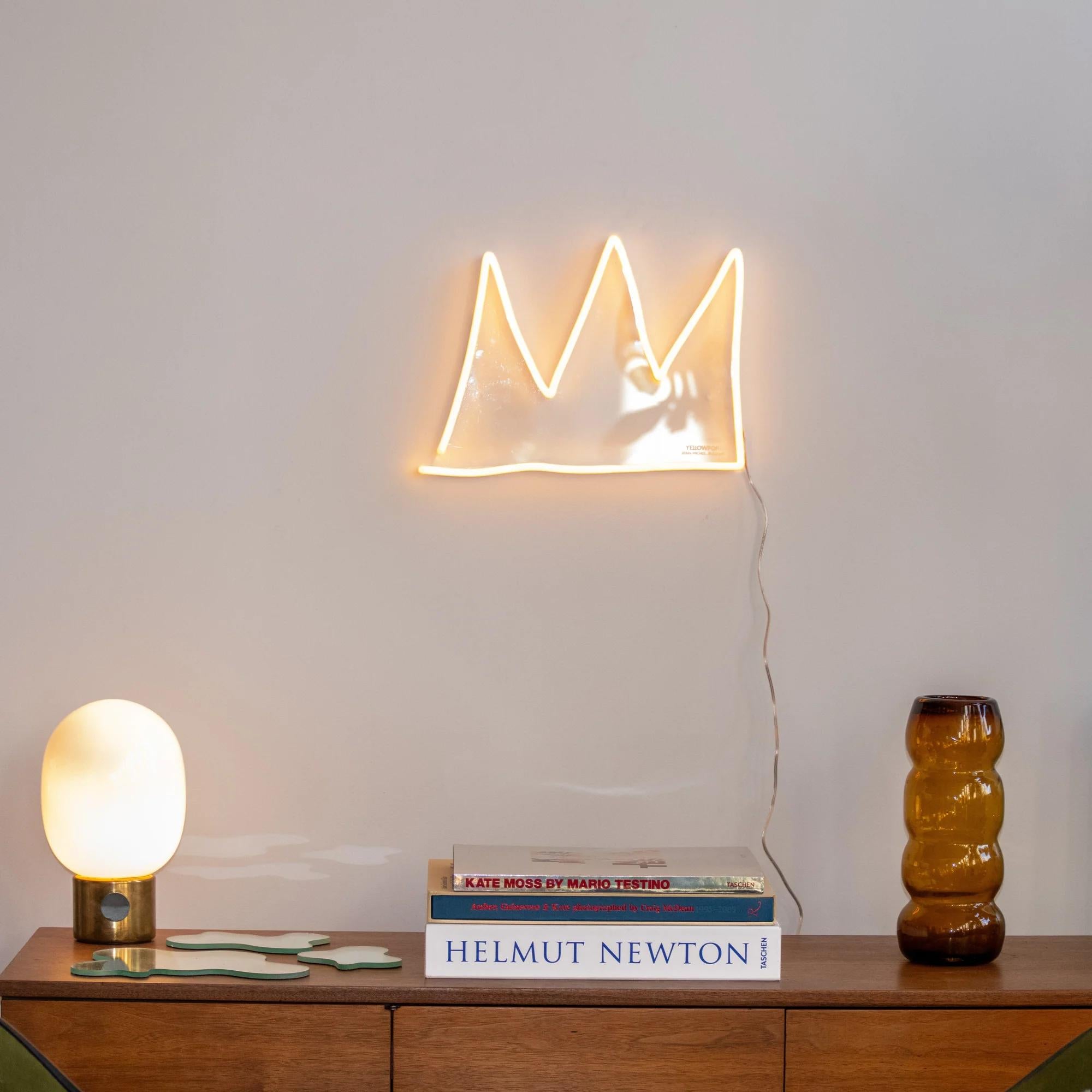 The Crown YP x JM Basquiat

Date of creation: 2024
Medium: PVC or Silicon piping with LED lights mounted on recycled acrylic board
Edition: Open
Size: 40 x 30 cm
Condition: Brand new

The crown is one of the most recurrent symbols in Jean-Michel