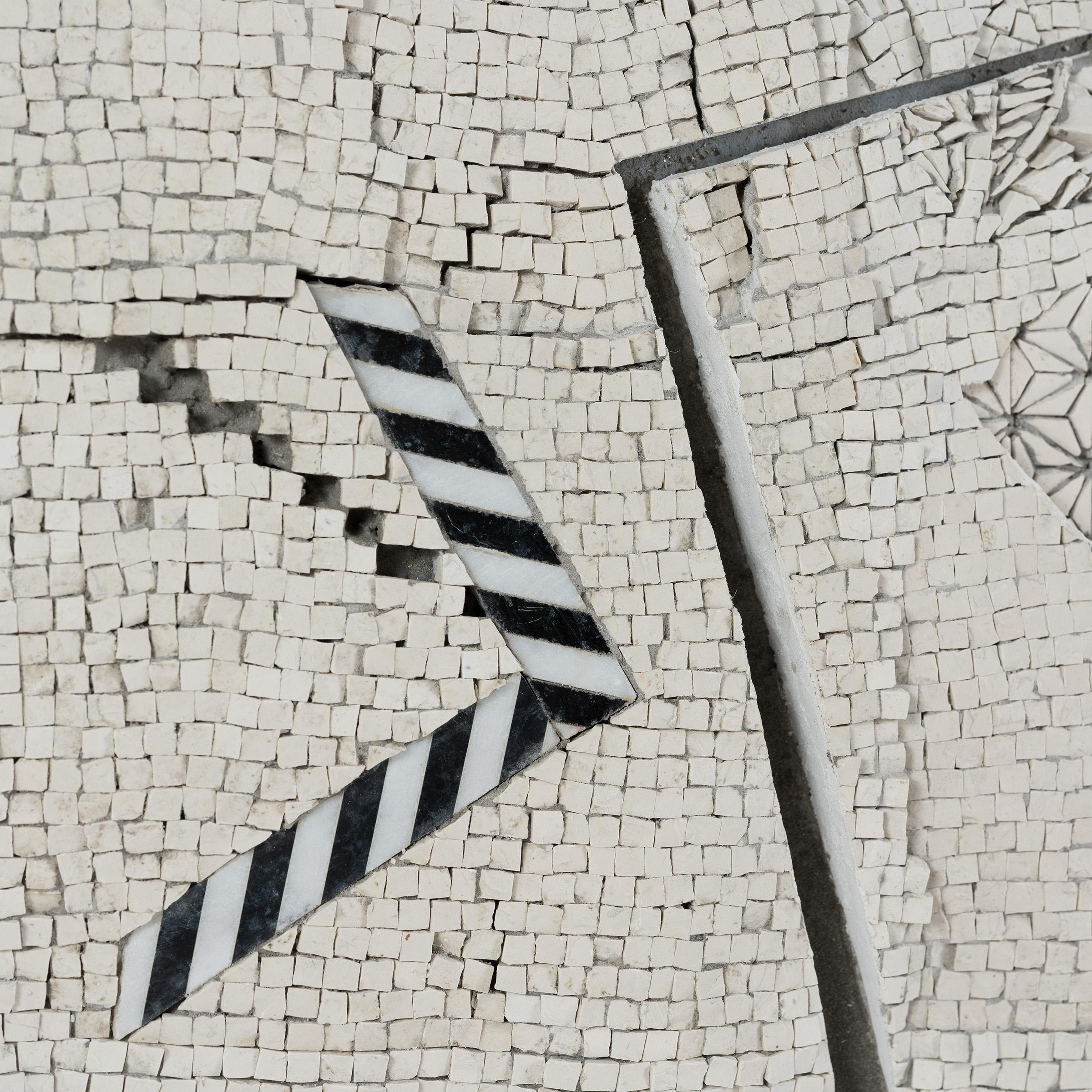 Monochromatic, ethereal and highly textured, the abstract compositions of Japanese mosaic artist Toyoharu Kii reflect a sophisticated approach to the technical art of mosaic making. Classically trained in Florence, Italy, Kii creates his modern