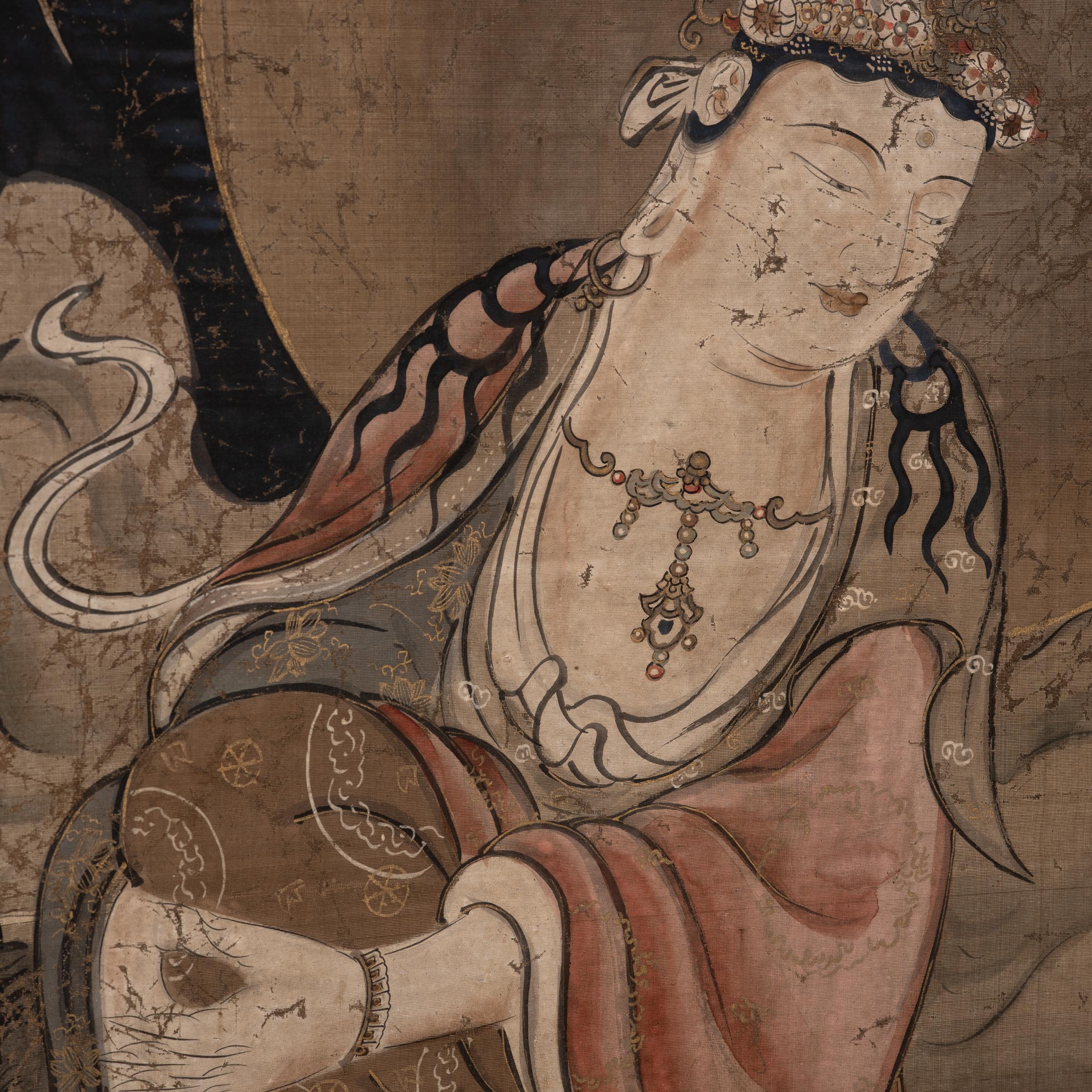 This exquisite hanging scroll painting from the late 18th century depicts the sacred form of the bodhisattva Guanyin, known in Japanese Buddhism as Shō Kannon, or Guze Kannon. Described as the 