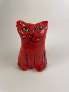 Petit chat, yeux rouges et jaunes, 2022