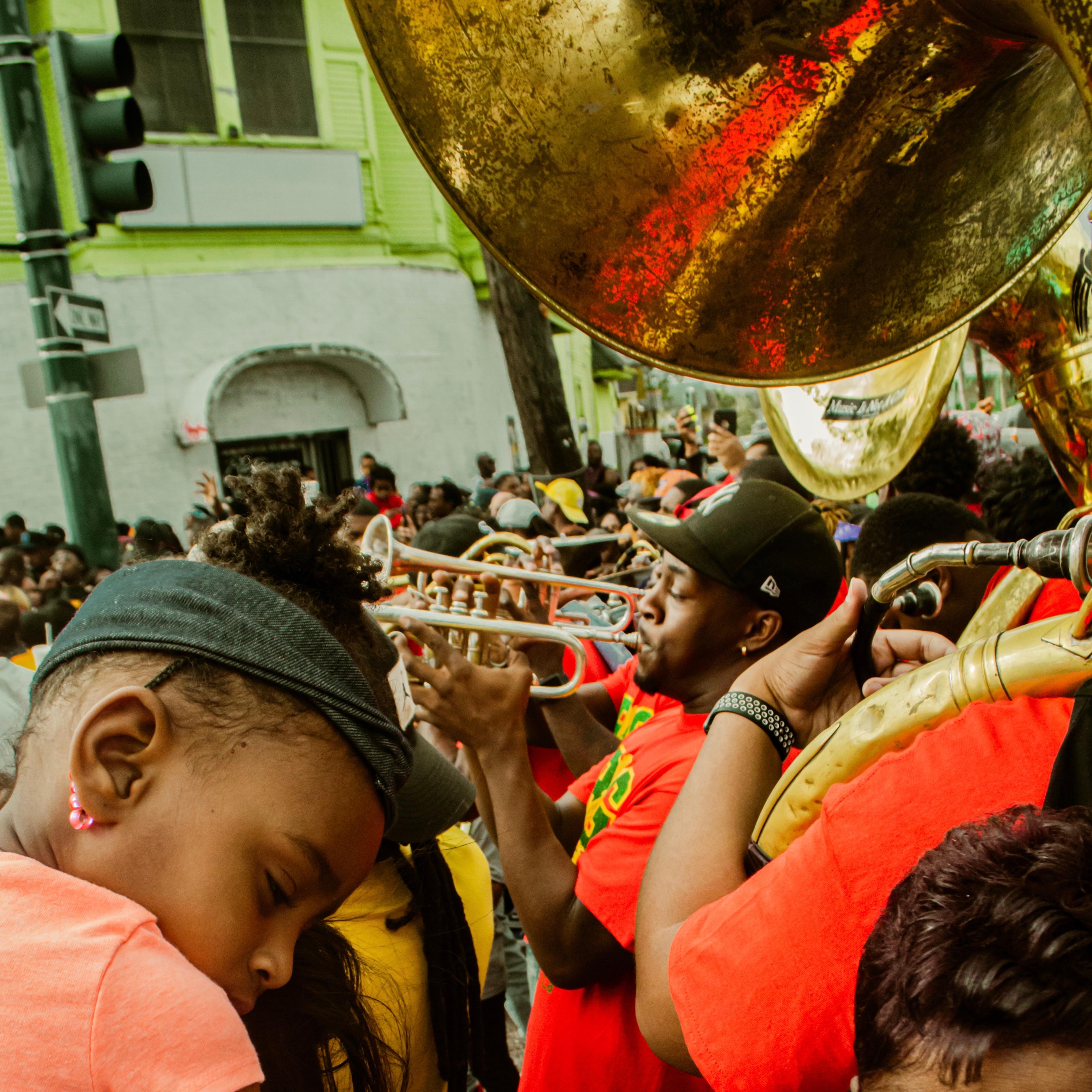 Trenity Thomas Figurative Photograph - Girl Sleep During Second Line