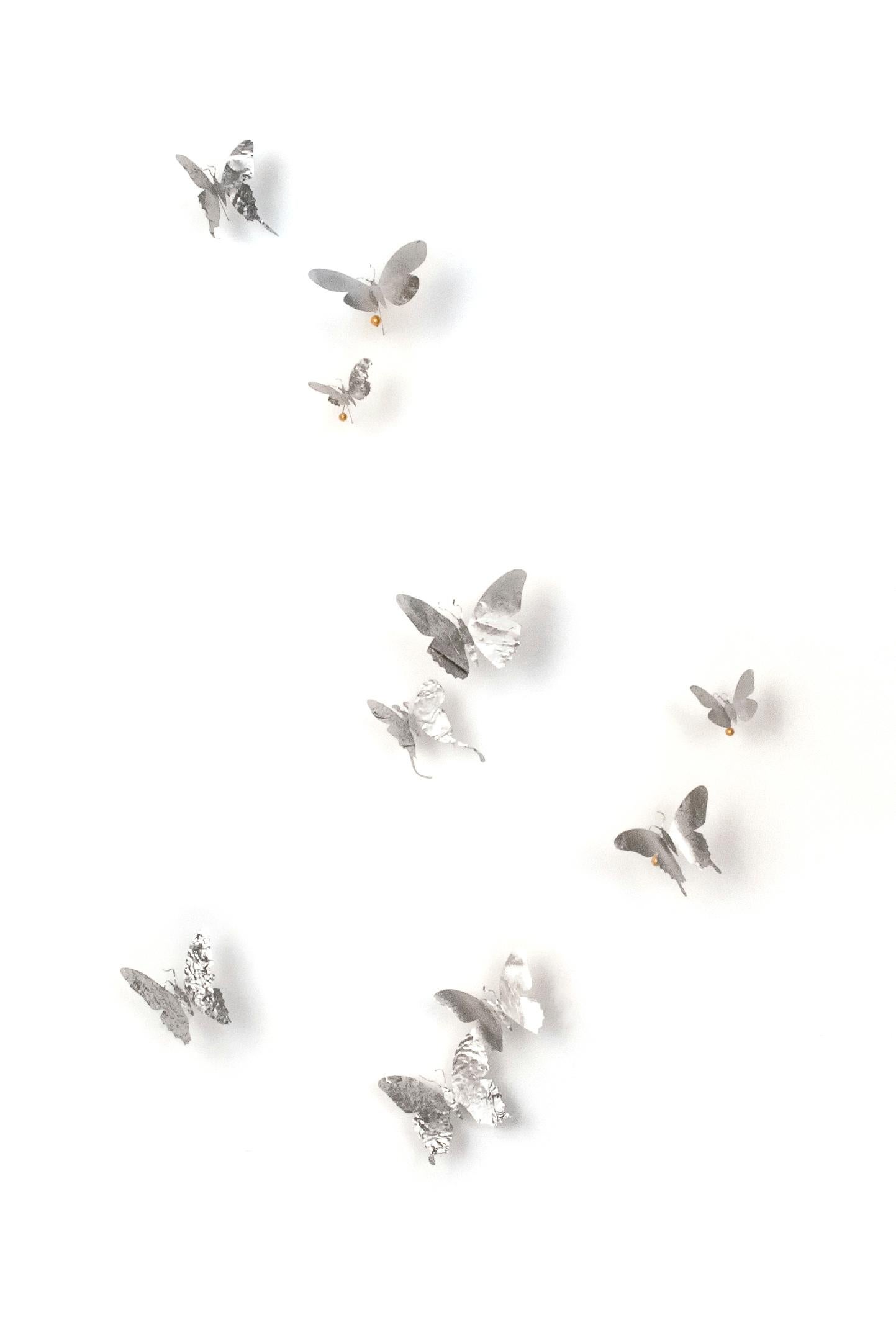 medium: aluminum (found cans), wire, white Flashe paint

Available in multiple color/finish options (inquire with gallery).
Installations are made to order, sizes and shapes of butterflies vary. 
Unique, open edition.
Ships with installation