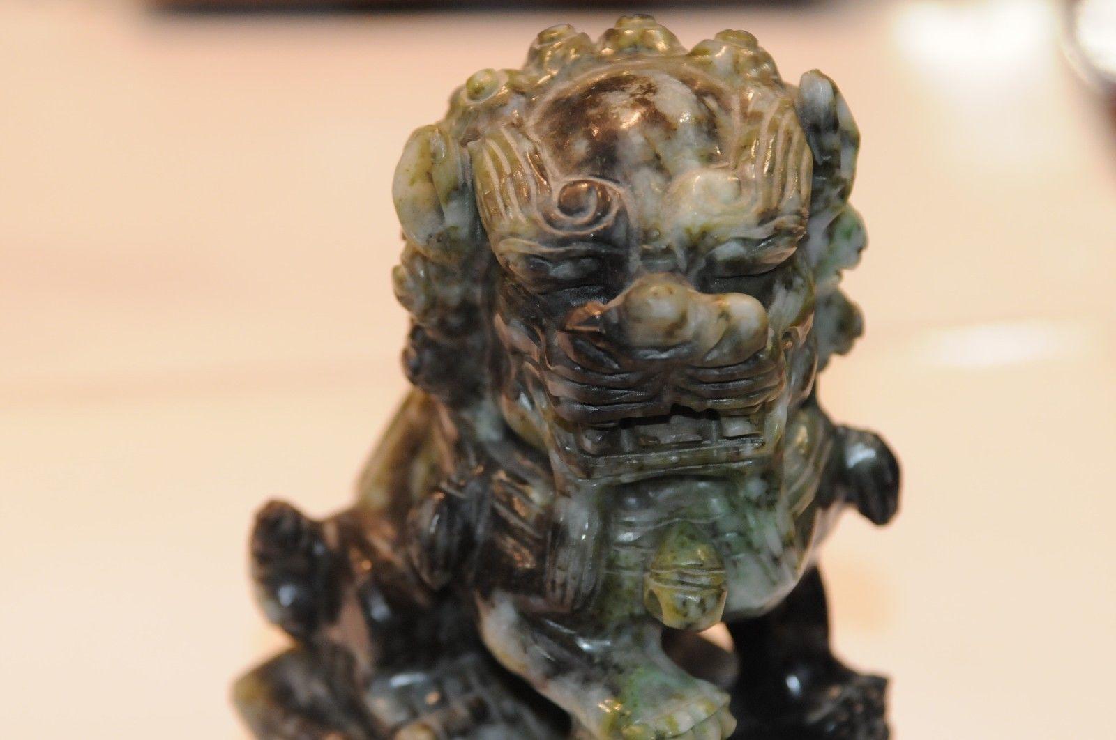 Heavy and very nice Jade Lion
China around 1910
Good condition! See the detailed images!
(One small part of an edge of the stand is not quite complete)
Height ca. 15 cm
