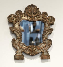	 A silver plated copper mirror - repoussé on wood - probably Austria - 18th cen