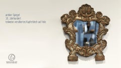 A silver plated copper mirror - repoussé on wood - probably Austria - 18th cen