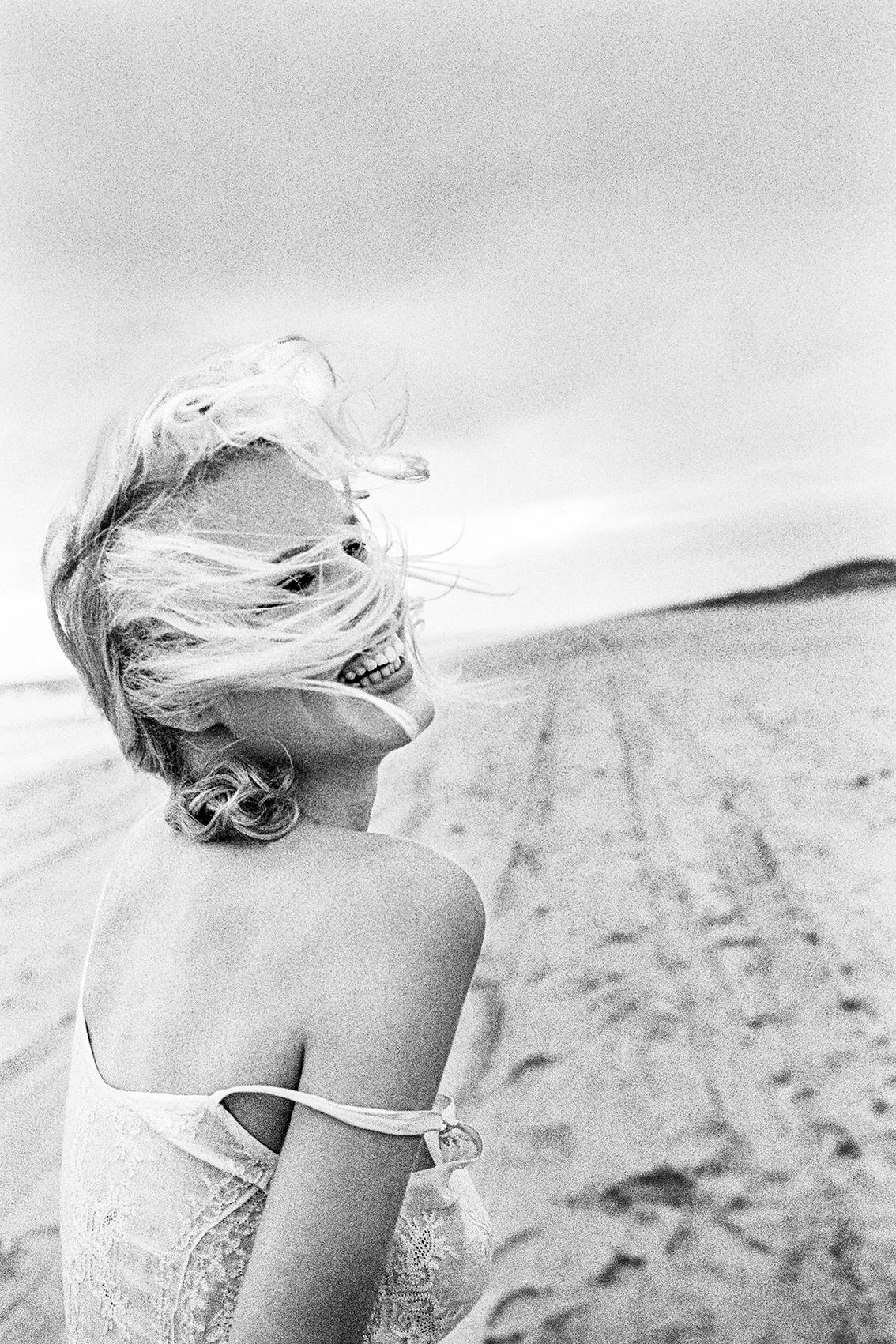 Hannes Schmid Black and White Photograph - "Always remember to smile and look up at what you got in life.", The Hamptons