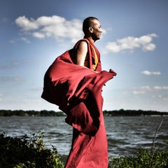 Precious by Can Turkyilmaz. Photograph Monk in red by lake