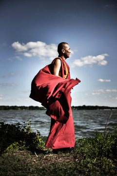 Precious by Can Turkyilmaz. Photograph Monk in red by lake