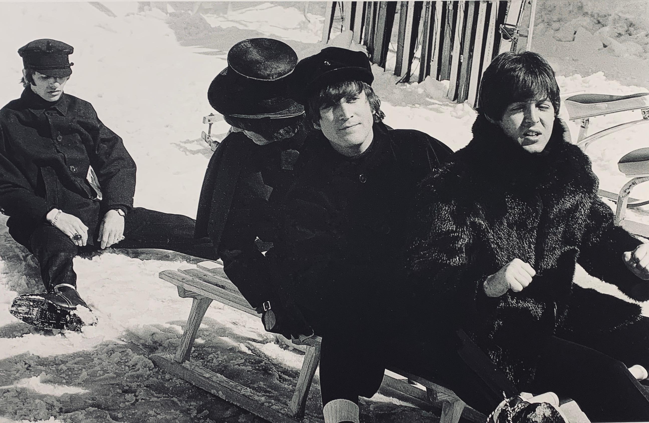 Very rare original photograph by German celebrity photographer Roger Fritz.  The image featuring all 4 of the Beatles sledding in the snow is from Fritz's collection that has been unseen by the public until now.  His captivating images of the