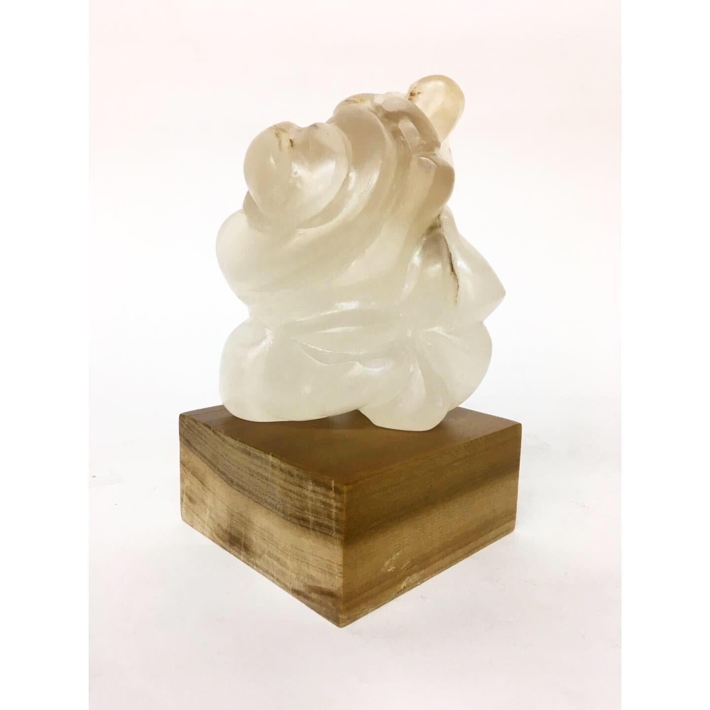 "LUSCIOUS" sculpture by Melanie Newcombe
Hand carved alabaster stone with or without the wooden base
The alabaster stone is reversible 
5" x 4.5" x 5" inch
2018

* * * Melanie Newcombe * * *
Melanie Newcombe is an American sculptor who lives and