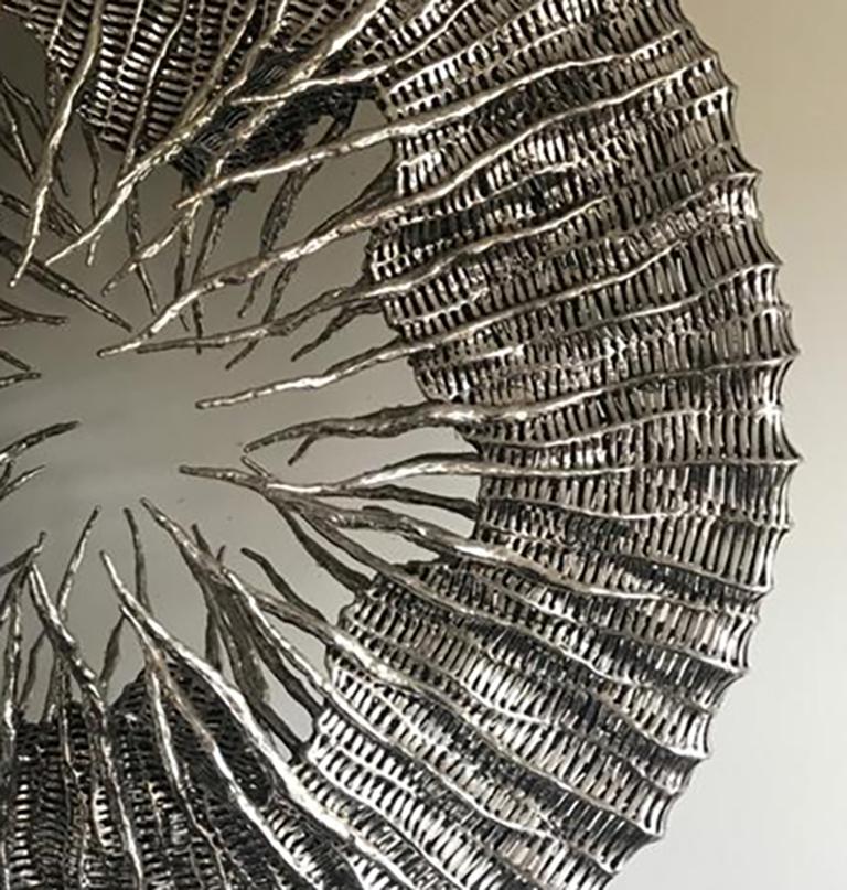 Stainless steel sculpture

Liechennay was exposed to the creative process from a very young age through his mother’s artistic pursuits as a designer of gold jewelry in Indonesia, his home country, where he studied and started a successful career in