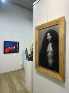 Scilla- 21st Century Italian charcoal drawing of a nude woman with long hair