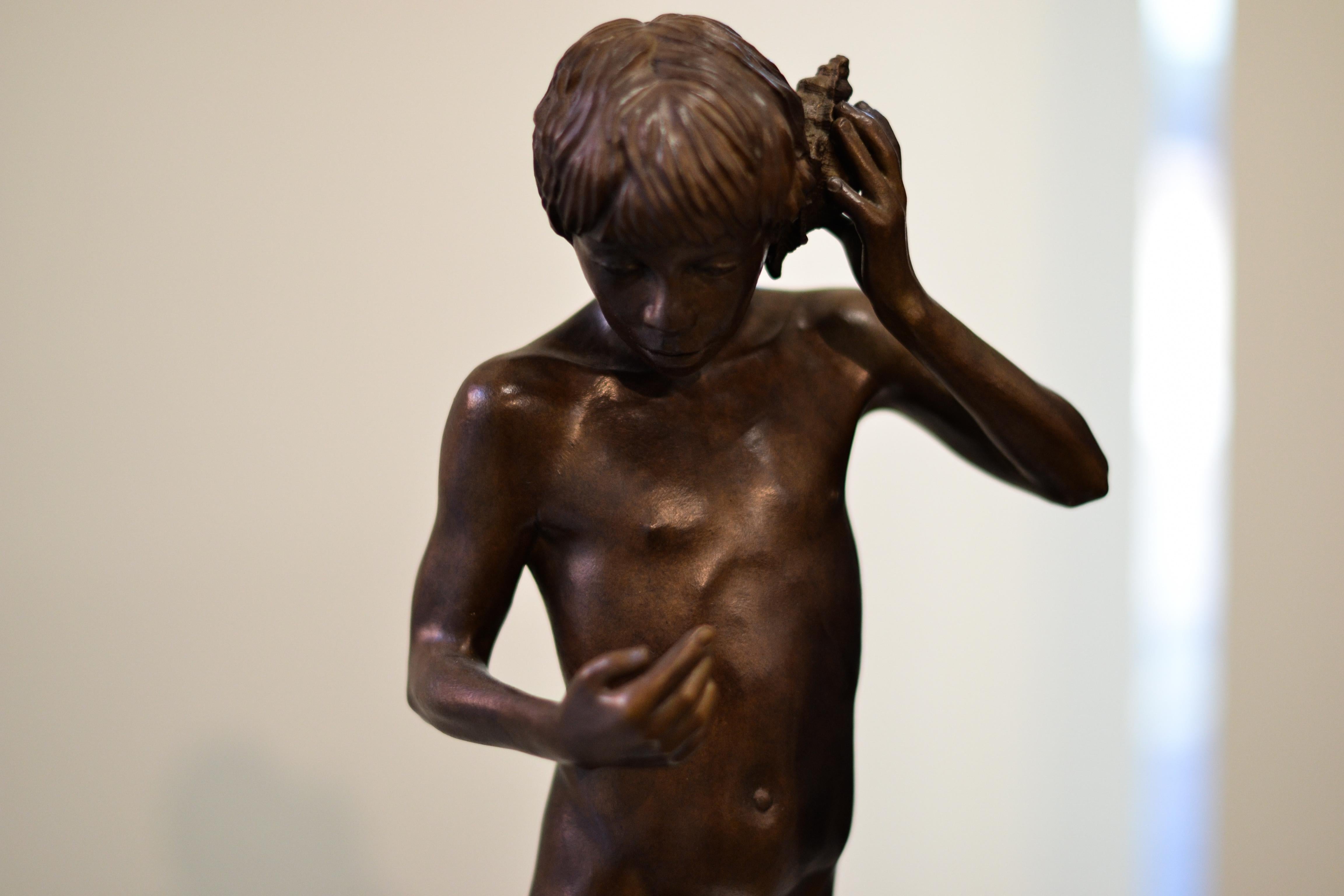 Aestus- 21st Century Bronze Sculpture of a Young Nude Boy with a Shell 3