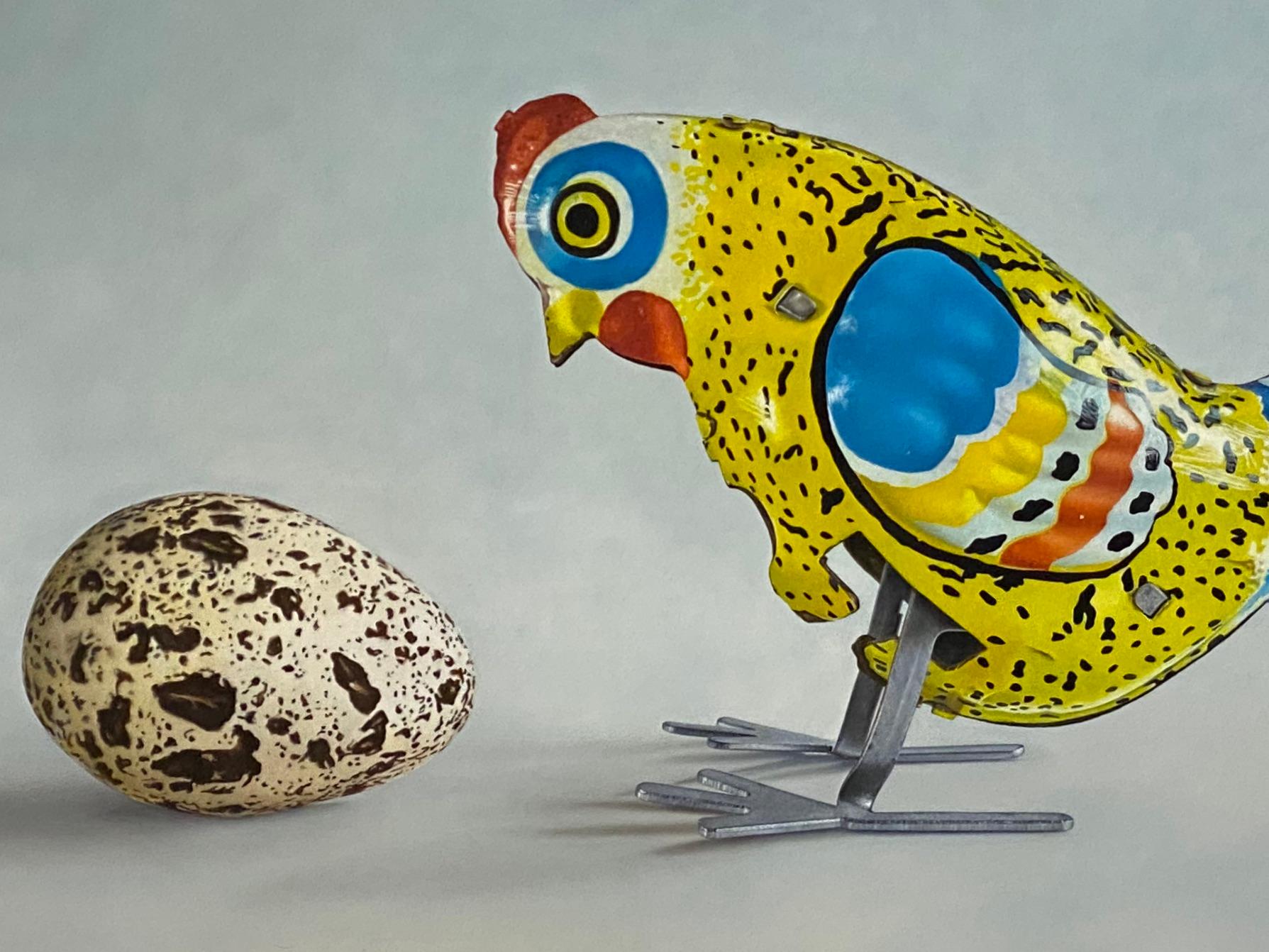 Huh? - 21st Century Dutch  Still-life painting of a Tin Toy Chicken and an egg - Painting by JP Marsman