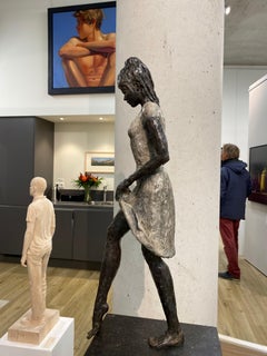 Spring- 21st Century Sculpture of a young woman with a foot in the water