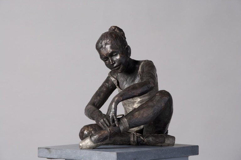 Romee Kanis Abstract Sculpture - Vasily- 21st Century Sculpture of a ballet dancer sitting and tidying her shoe