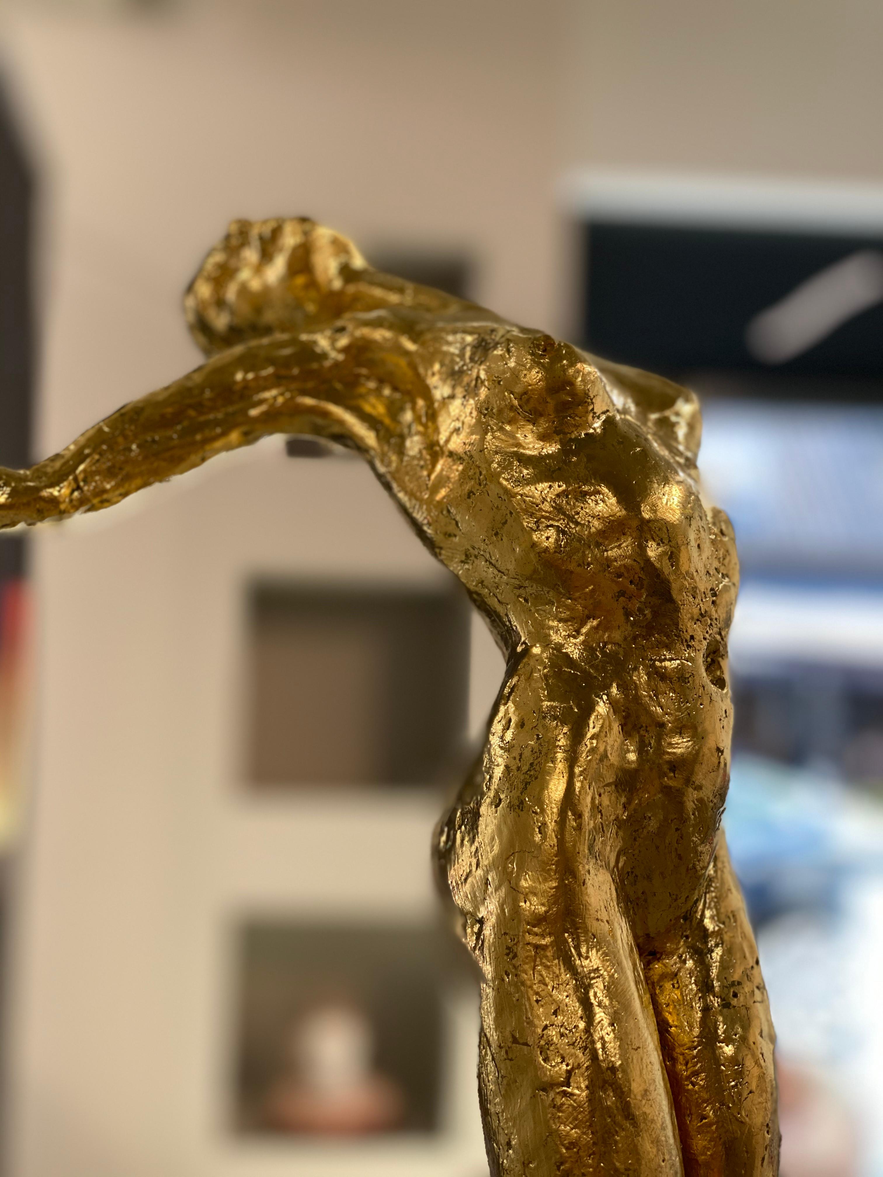 woman gold statue