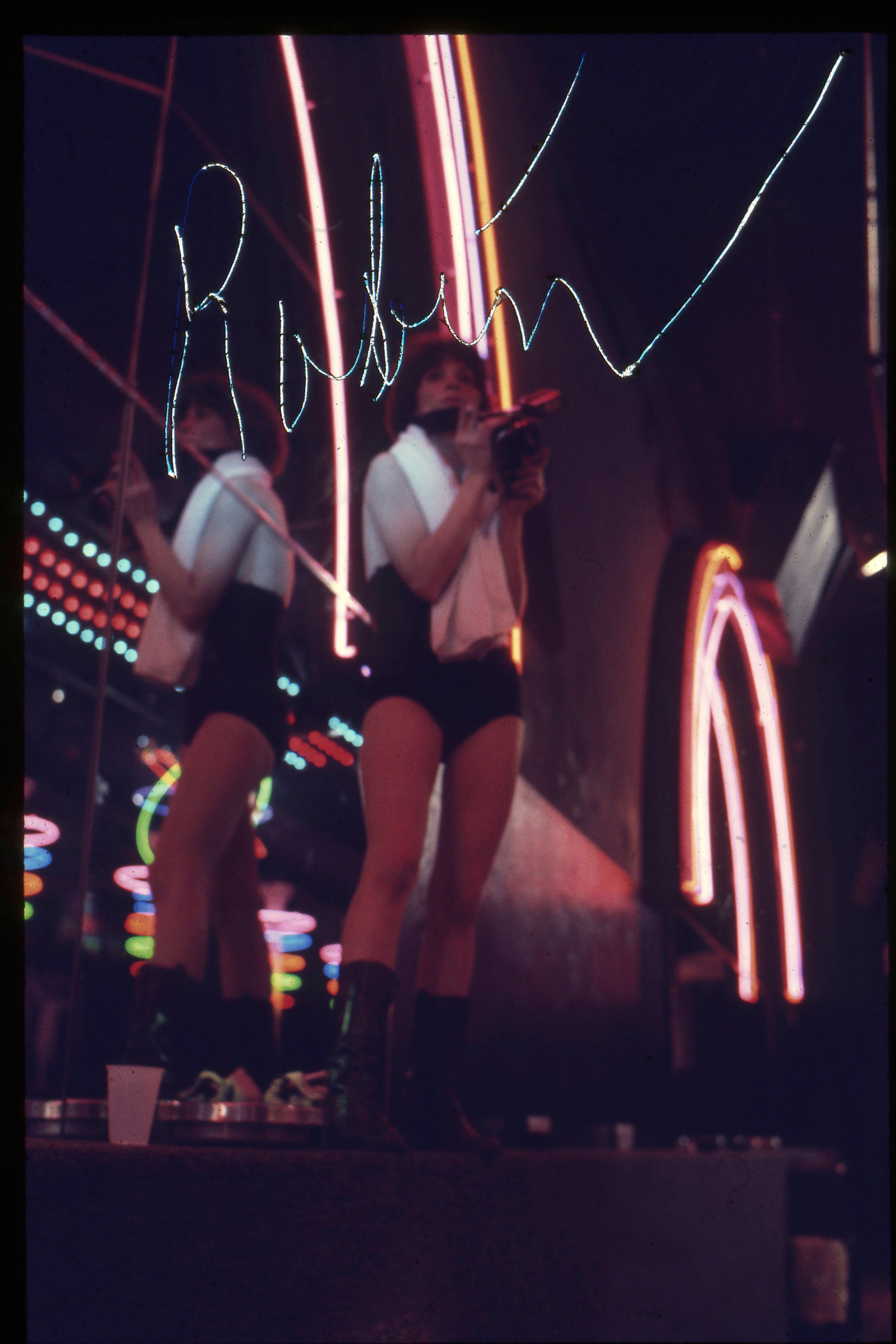 Robin Rice Color Photograph – Robin Shooting, Infinity, New York, NY, 1976