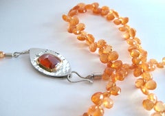 Mandarin Orange garnet necklace & Spessartite Garnet cabochon clasp by Susan Kun