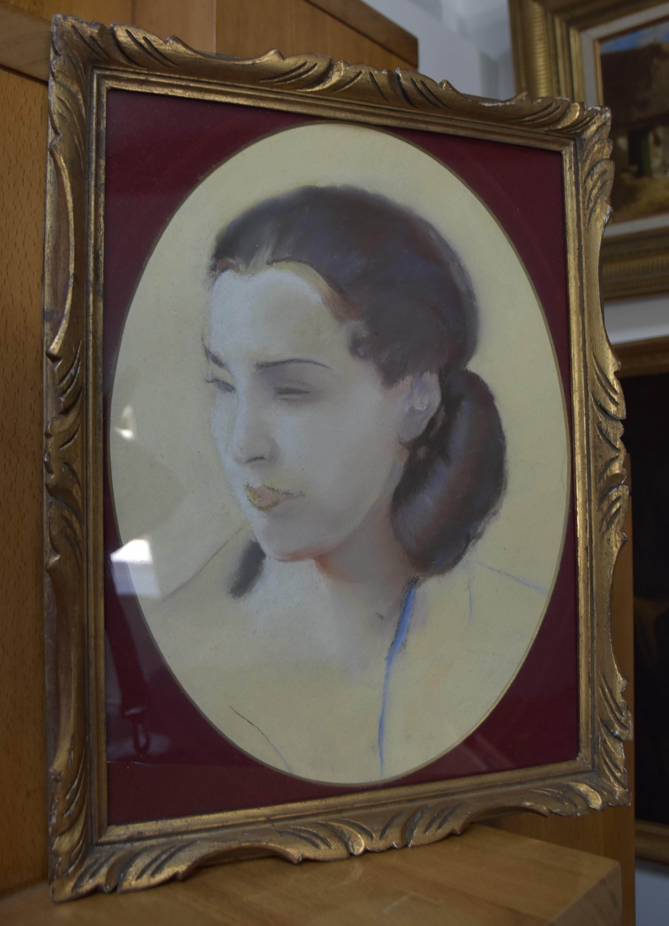 L V Guirand de Scevola (1871-1950) Portrait of a young woman, 1928, oval pastel For Sale 2