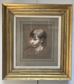 Lucien Victor Guirand de Scevola (1871-1950) Portrait of a boy, signed pastel