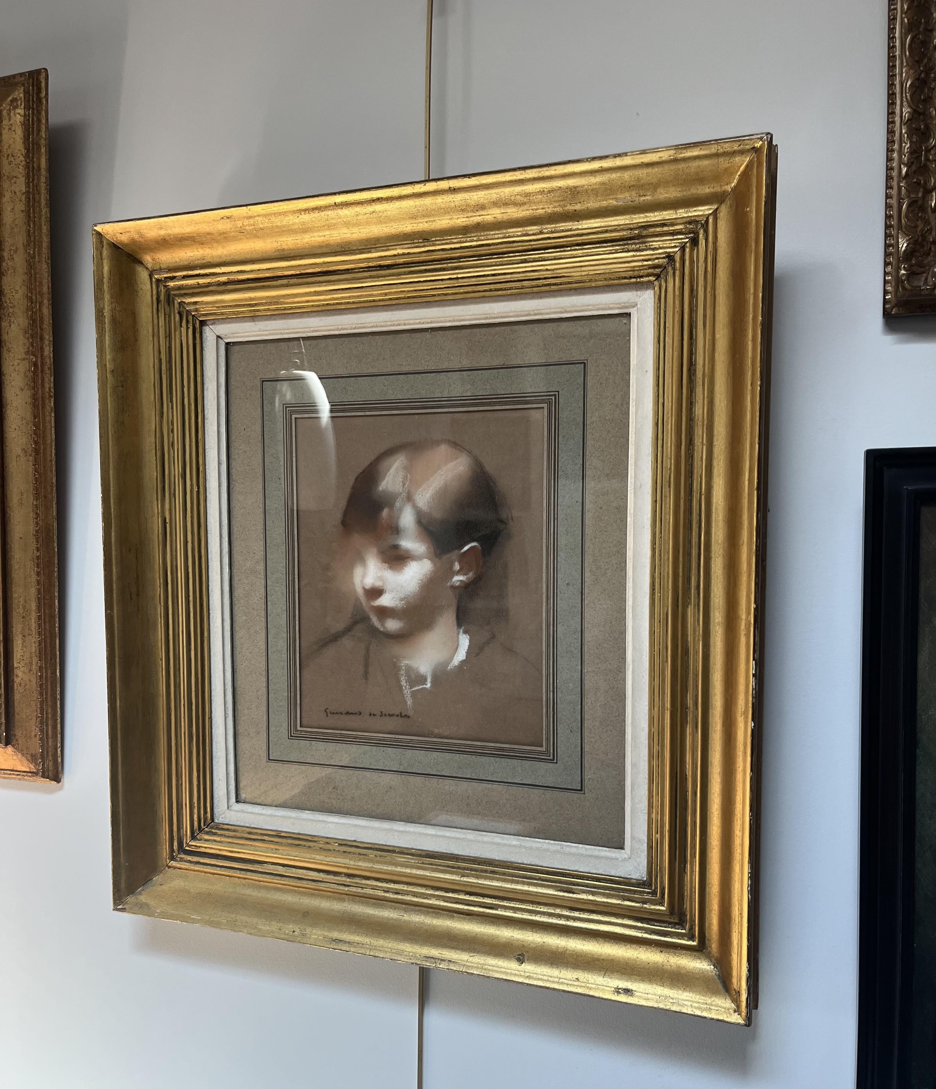 Lucien Victor Guirand de Scevola (1871-1950) Portrait of a boy, signed pastel en vente 1