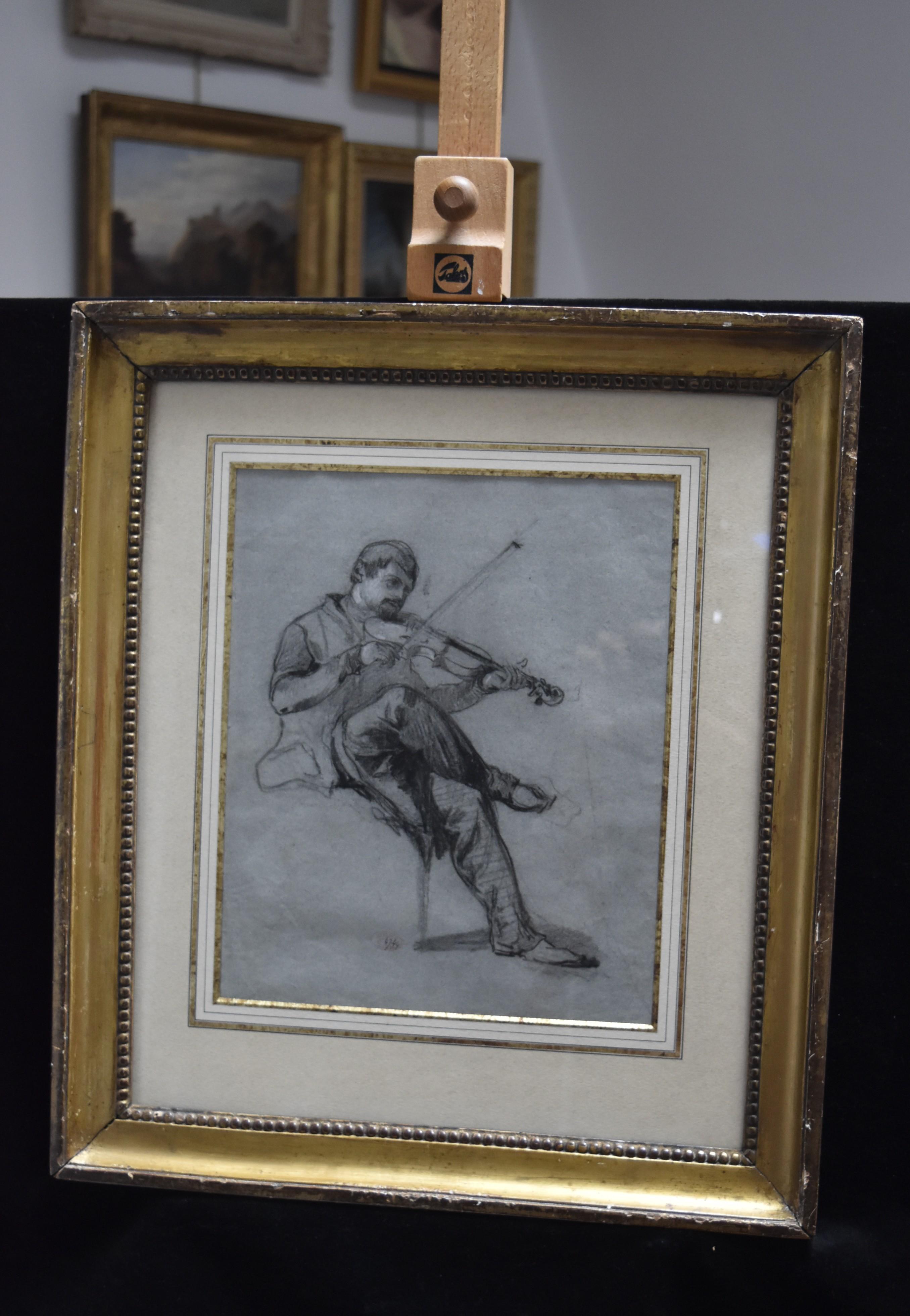 Felix Ziem (1821-1911) 
A Violonist
Charcoal and heightenings of white chalk on grey blue paper
28 x 23 cm
Stamp of the estate of the artist (Lugt 3707) and numbered 47444 on the bottom center
In a period frame : 47 x 41 cm

Provenance :
Estate of