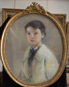 L V Guirand de Scevola (1871-1950) Portrait of a young boy Signed pastel