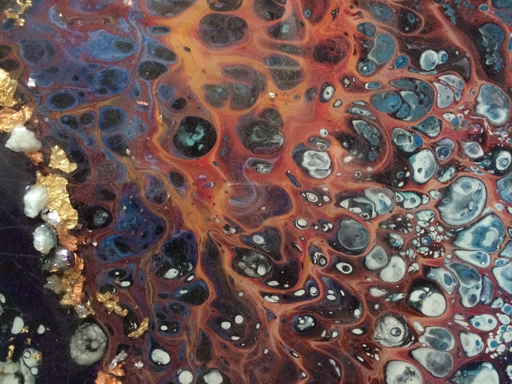 Nothing less than trending to the moment, Albuquerque artist Tina Louise Lambert applies multiple gravitational effects to create this multi-layered, multi-media, extremely exciting original work of art in resin.  Reminiscent of a natural geode,