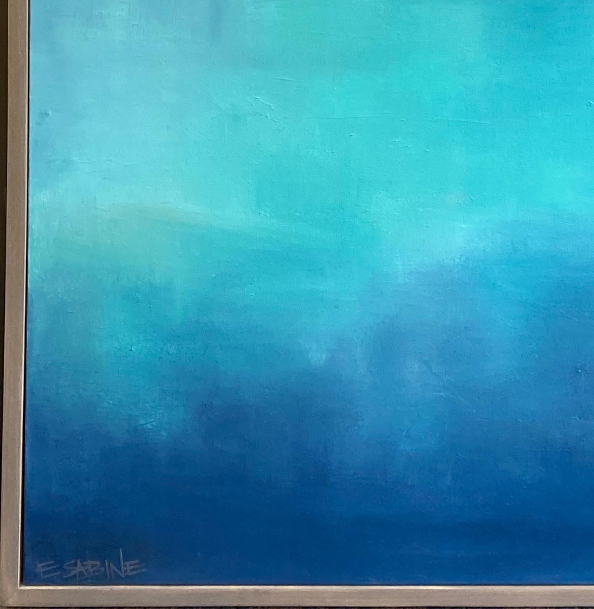 A colorist's abstract, the bird's eye deep blue abounds with nuances of blue green values that are then subjected to varying concentrations of light.  The result is a breathtaking exploration of sea and sky. The custom made bleached wood  frame on