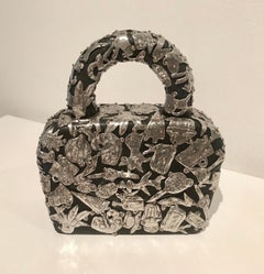 Female Fetish Small Handbag, small scale sculpture in pewter and wood