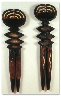 Shamans, male and female wood totems