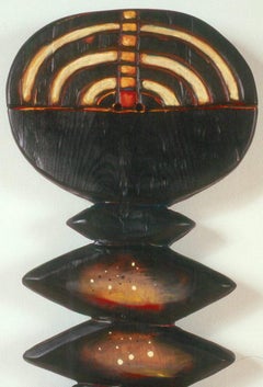 Shamans, male and female wood totems