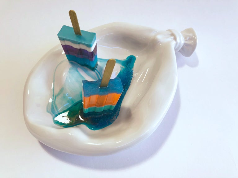 This is a one-of-a-kind resin and ceramic sculpture by Betsy Enzensberger in collaboration with Made By Humans. 

Betsy Enzensberger sculpts works that create a visceral longing and remembrance of the most nostalgic delights from childhood. The