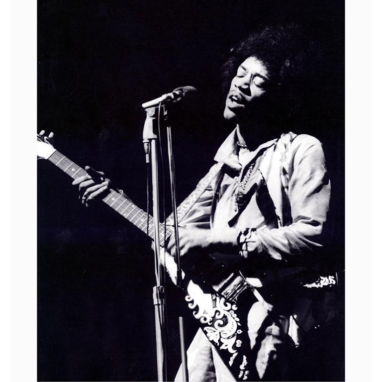 Jimi Hendrix Paris Olympia Rock flying V Gibson 1967 Photography Black and White - Print by Christian Rose