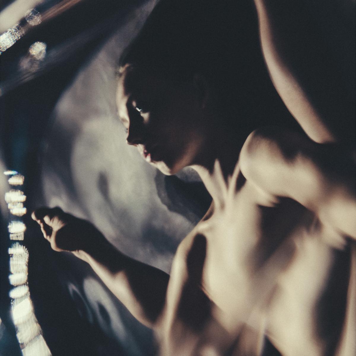 Marius Budu’s photographs explore the duality of strength and fragility in the human condition, creating almost abstract images that invite us to contemplate the beauty in the common elements of the body. His oeuvre is easily recognizable for the