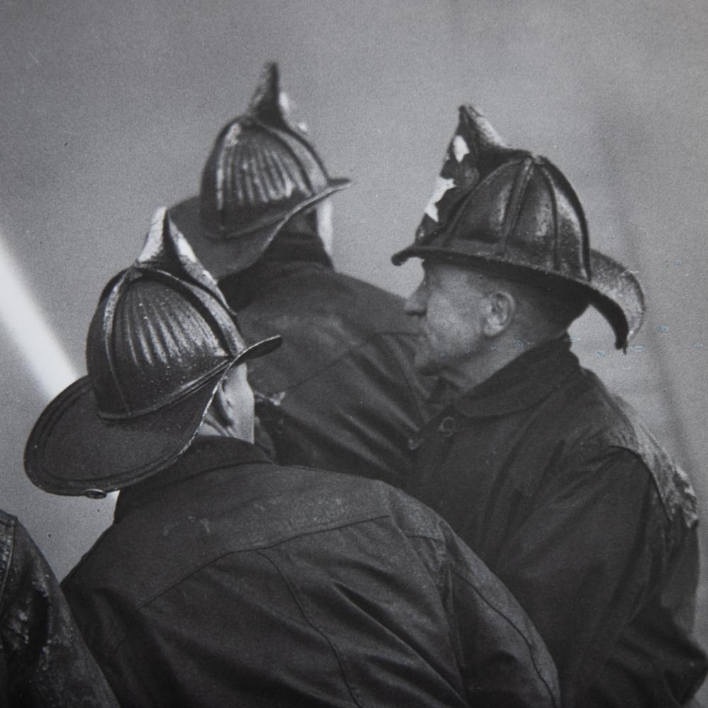 Fine Fireman 1940s Mid Century WPA Era Modernism Baltimore Black & White Photograph. A. Aubrey Bodine (American, 1906-1970). Gelatin silver print, signed upper right, photographer stamp on verso, 11 x 14 in.

In photographic circles around the