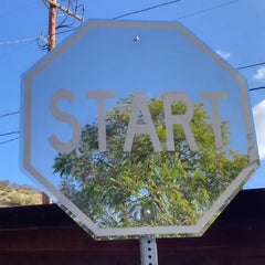 ""Start" - Finition miroir - Sculpture d'art urbain en acier inoxydable poli