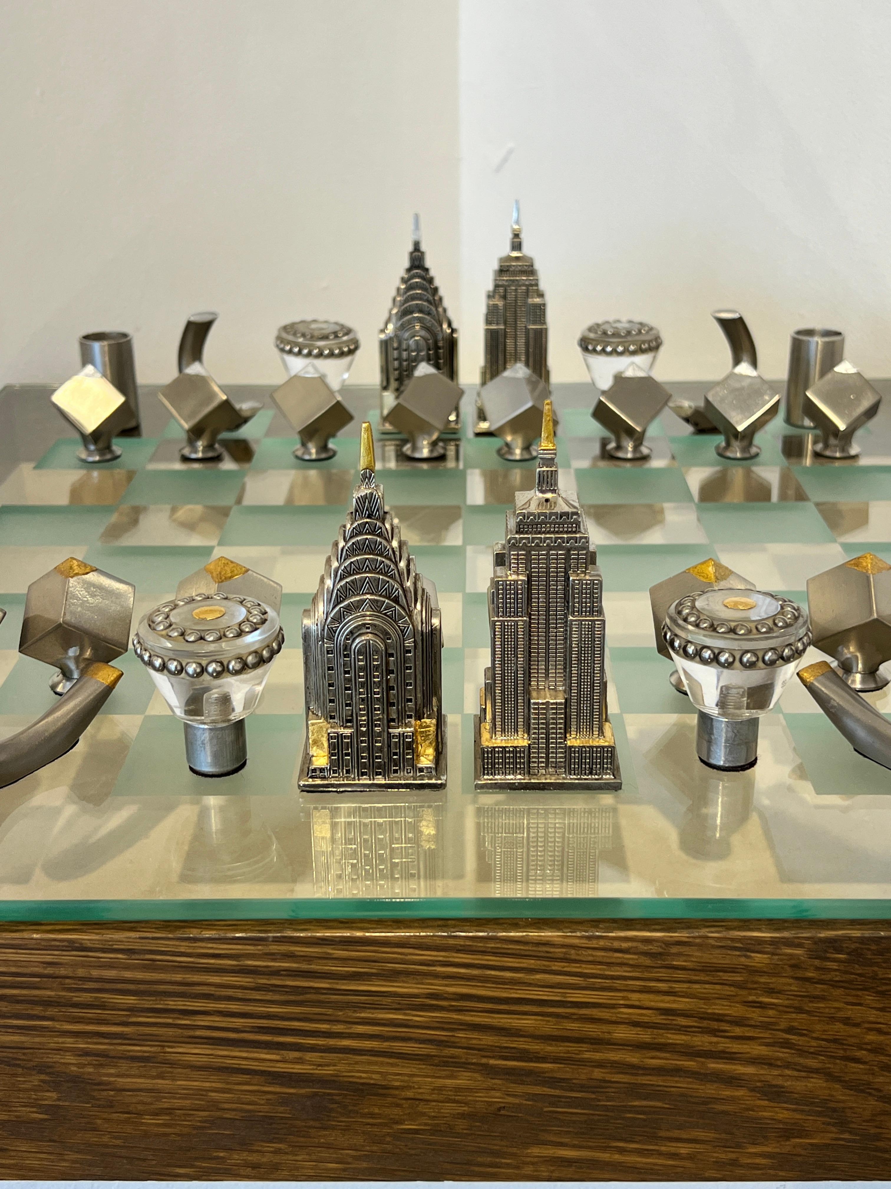 This beautiful one-of-a-kind chess set designed by artist Cyrice Griffith using found objects to create a luxury art deco inspired functional piece of art.  The artist utilizes the concept of up cycling in her creations to create a classic meets