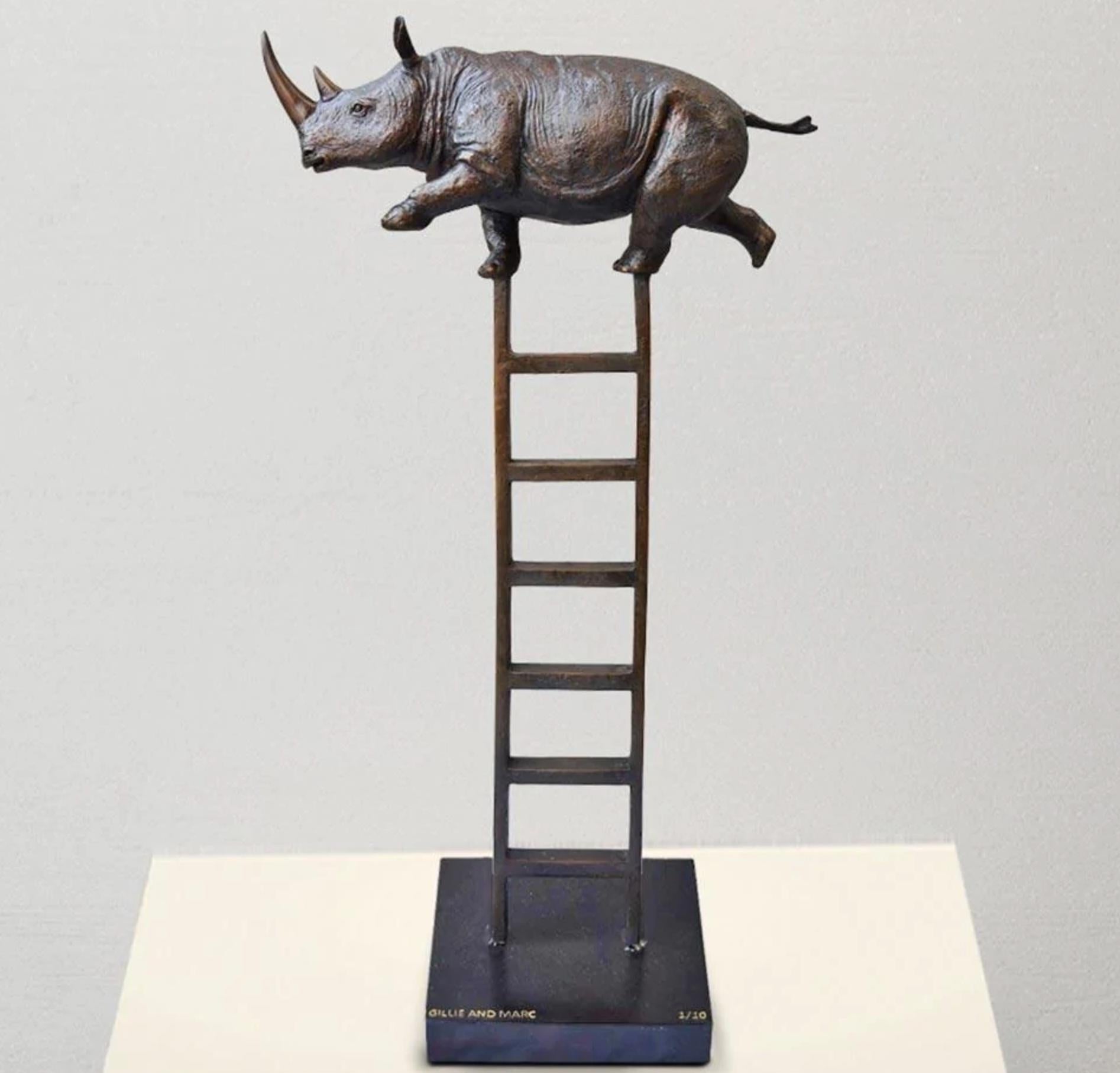 Title: Rhino reaches new heights 
Authentic bronze sculpture

This authentic bronze sculpture titled 'Rhino reaches new heights' by artists Gillie and Marc has been meticulously crafted in bronze. It features a Rhino balancing high up on a ladder