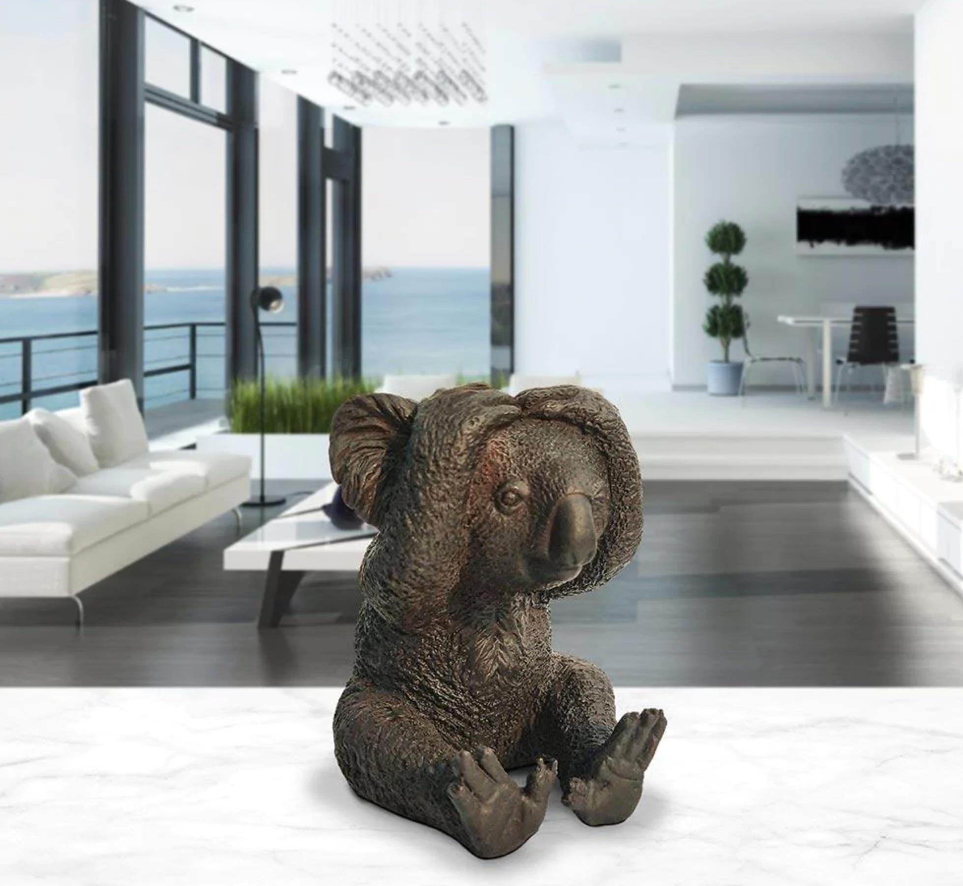 Title: Kevin The koala feels shy
Authentic bronze sculpture

This authentic bronze sculpture titled 'Kevin The koala feels shy' by artists Gillie and Marc has been meticulously crafted in bronze. It features a koala sitting and comes in a